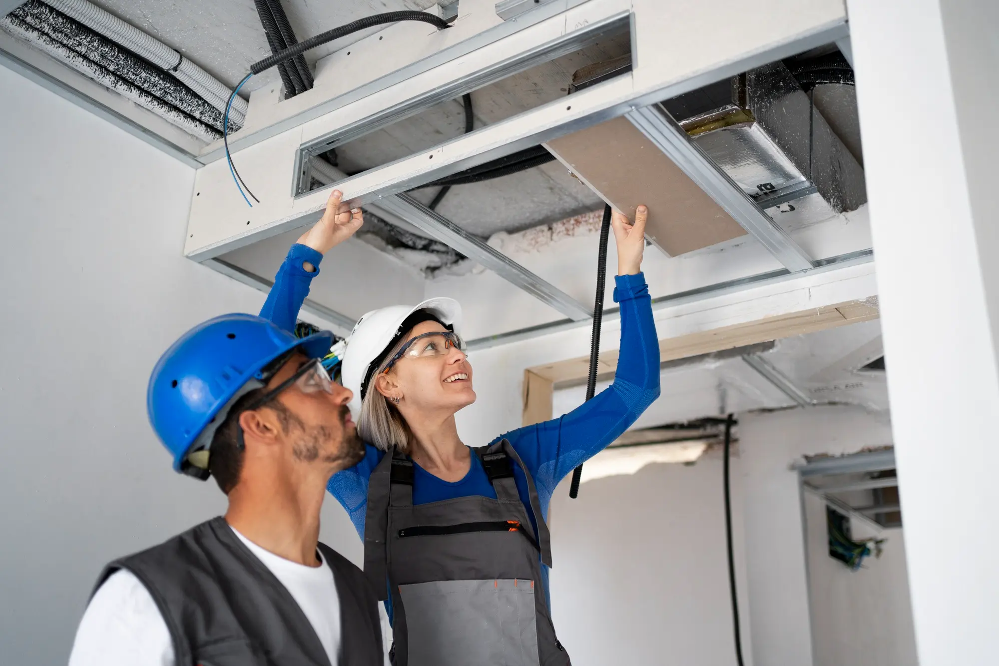 Home service team checking ceiling