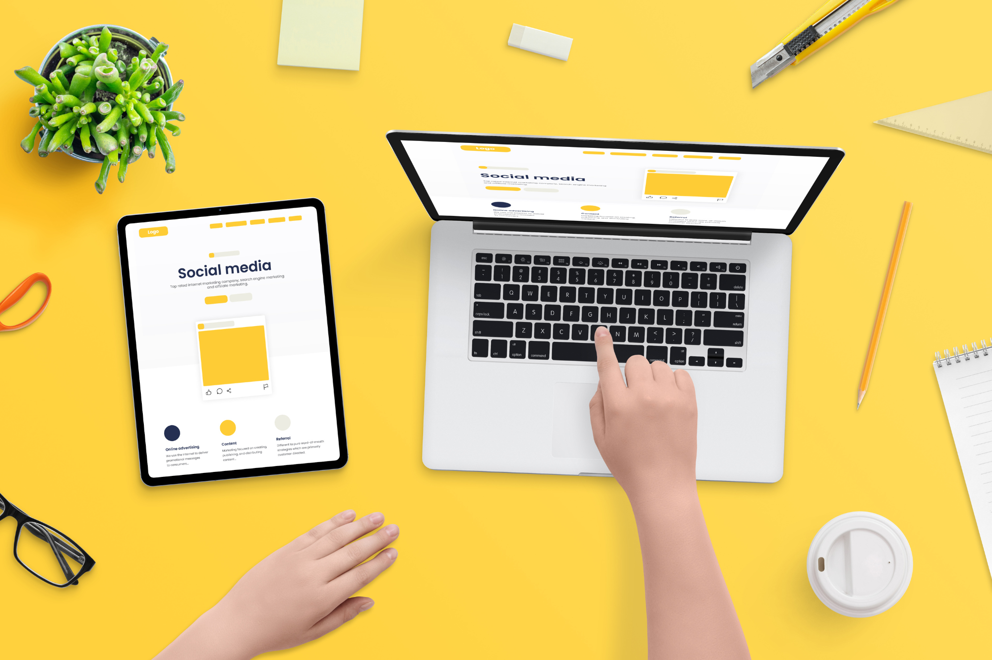 laptop surrounded by notepads and stationery, symbolizing generating business through online queries